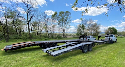 The shorter of Jason Kendall’s two Kaufman Manufacturing trailers is a two-car unit that he bought new for $7,200. The second trailer, a 44-footer, has a wedge-style ramp on the front to allow for loading a fourth car above the trailer neck. “New, that trailer’s about $13,000,” he said, but he paid $8,500 for it used.