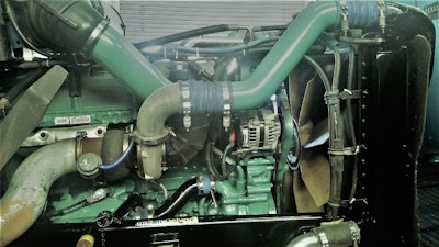 The Detroit Series 60 in Bill Ater’s 1999 Freightliner — as clean, perhaps, as the owner-operator’s forgiveness application for his Paycheck Protection Program loan, stalled in process at the moment with the credit union through which he applied for PPP to begin with.