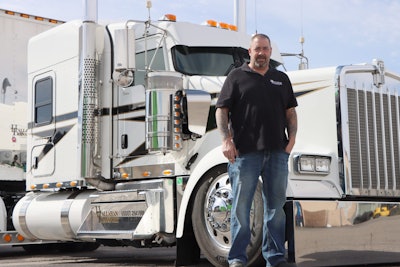Robert Hallahan and the fleet’s flagship W900L, Occupational Therapy.