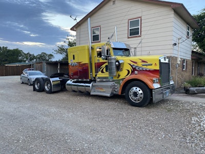 This 1999 Kenworth W900L, entered by Mike Blackburn and owned by Leroy Baxter, is competing in the Working Bobtail 2013 & Older class.