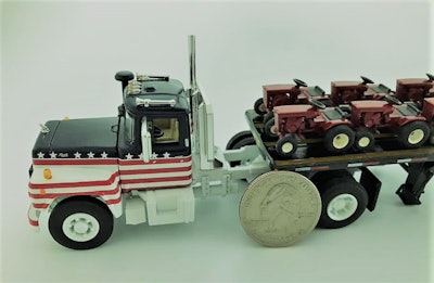 For a little scale perspective — yes, that’s a quarter. The small tractors are built at 1/64 scale and the photo was posted to advertise their coming availability. When Hoffman’s able to do a production run of about 100 units, the truck-tractors he does cost around $100 shipped, essentially just to cover his costs in the operation. The much smaller garden tractors, though, in this case, he noted will be $38 each if shipped in the U.S.