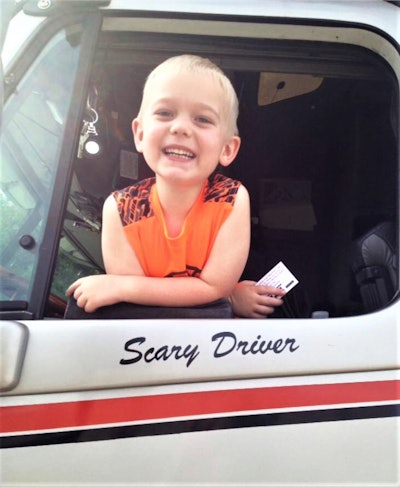 kid inside semi truck