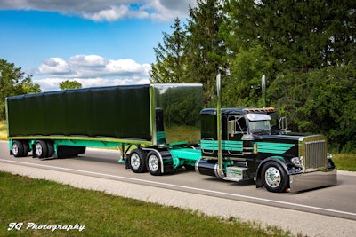 Kiegan Nelson and his 2013 Peterbilt 389 won first place in the Tractor-Trailer class. (Photo by JG Photography)