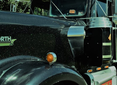 What’s not obvious from a distance are the gold flecks in the black paint job.