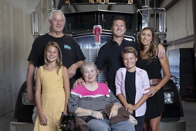 James Davis credits his success in part to the counsel of his father, Ed Davis (left), and his mother, Rayven Davis (seated), based on their business experience. Joining James Davis and his wife, Heather, are two of their five children, Liv and Ethan Davis.