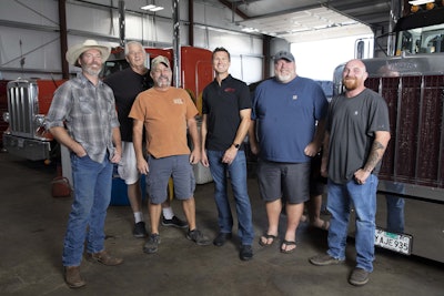 Some of JDT Trucking’s driver team (from left): Chris Cooper (who also works as a mechanic), Ed Davis (father of James), Robert Hall, JDT owner James Davis (who drives occasionally), Chet Mitchell and John Boyd.