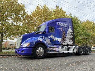 STUNNING DESIGN FOR KENWORTH HAULING U.S. CAPITOL CHRISTMAS TREE | A Kenworth T680 is now adorned with a stunning exterior graphics design in preparation for hauling the U.S. Capitol Christmas Tree from Colorado to Washington, D.C. Apex Transportation in Henderson, Colorado, will use the truck to transport the tree. The graphics package features a decorated Christmas tree and the U.S. Capitol Building, 14,023-foot Wilson Peak in Colorado’s Uncompahgre National Forest, and “From Colorful Colorado to America’s Capitol.”