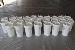 Buckets filled with alleged liquid meth drained from a truck’s fuel tanks. (CBP photo)