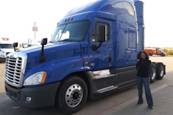 Kenyette-Godhigh Bell outside of her 2017 Freightliner Cascadia