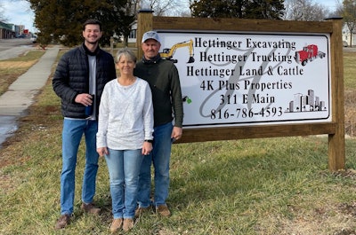 Mary Bohl, front, with two Hettinger dispatchers in front of the company’s sign in Drexel, Missouri.