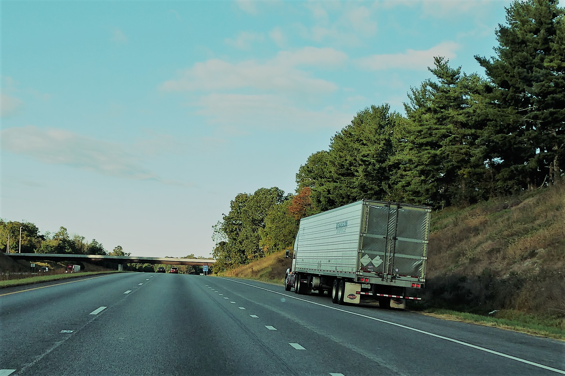 truck parked on the side of the highway