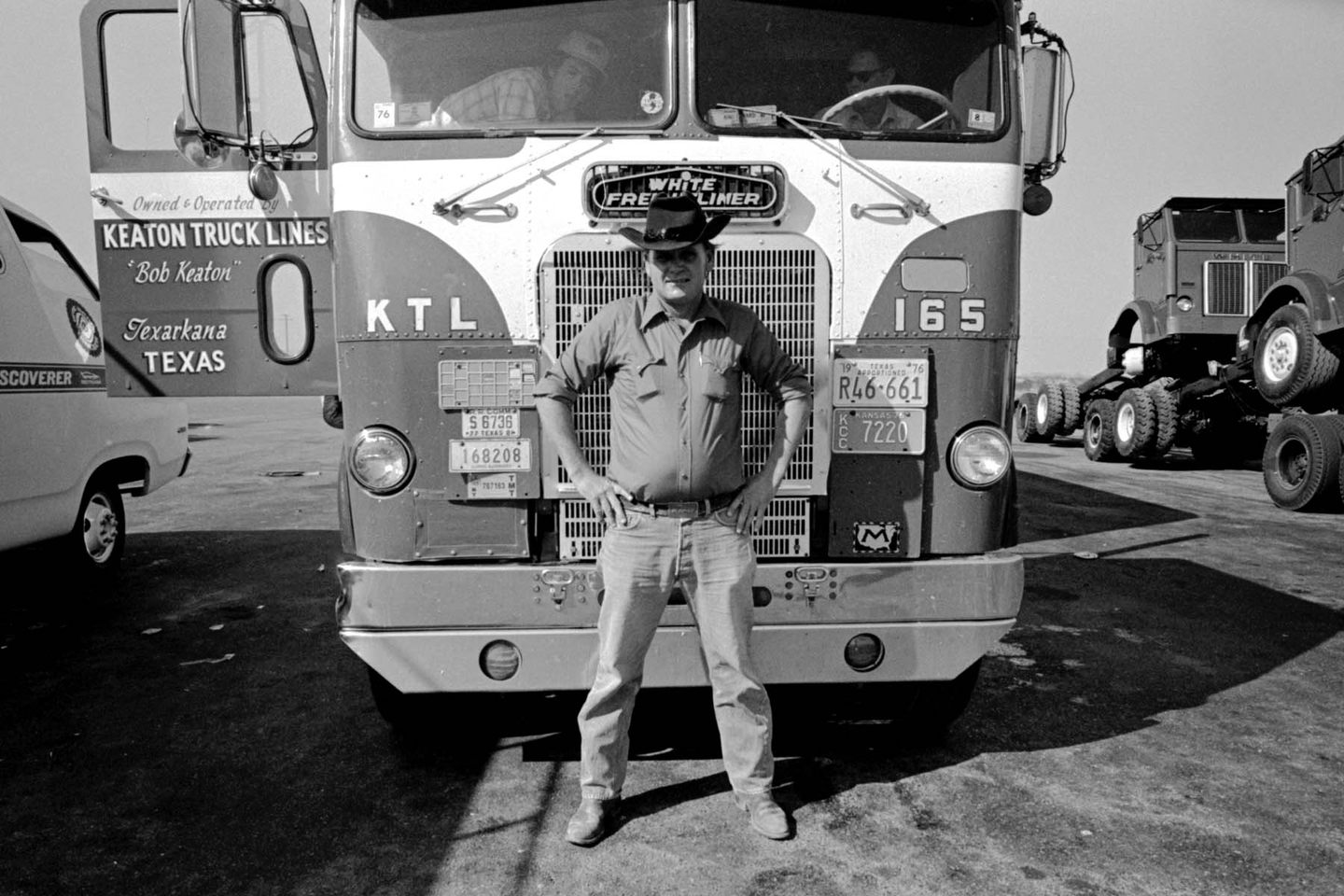 Jobie Vaden standing in front of a Keaton Truck Lines White-Freightliner truck