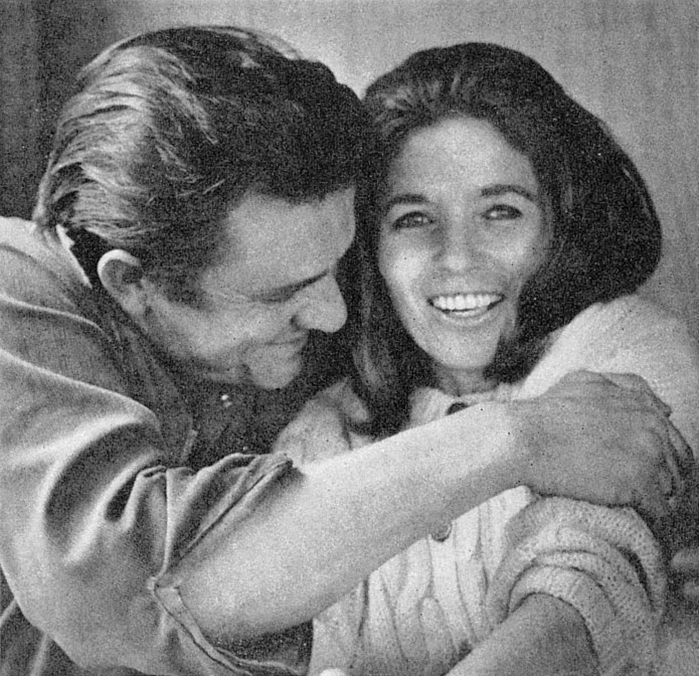 JohnnyCash hugging June Carter Cash in 1969