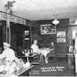 Three people eating at Trucker's Home in Arlington, Missouri