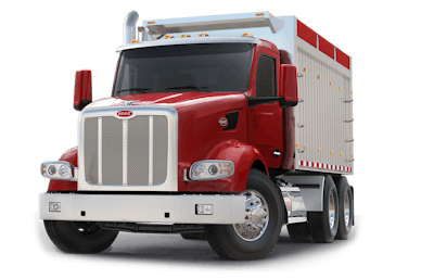 Updated Peterbilt vocational models | Peterbilt announced significant updates to the vocational Model 567 (pictured in a dump application) and 520 trucks. The key updates are found in the new VMUX electrical system, with enhanced functionality and integration with many different types of bodies for vocational customer applications. Exterior updates to the Model 567 include a cab-mounted side mirror, bright air intake bezel option and increased DEF tank volume. On the inside, the Model 567 features the 15-inch digital display launched with the new Model 579. A fully customizable user interface delivers easy-to read information and full PTO integration. Operators can fine-tune the display to suit individual preferences through controls on the all-new steering wheel. New driver-comfort features found inside include additional cabin storage, two permanent cup holders and options for 12V or USB charging ports. Safety systems, too, are integrated into the display -- such as lane-keeping assist, adaptive cruise control with auto resume, speed sign recognition, side objection detection, safety direct integration, multi-lane emergency braking and highway departure detection. The 567, combined with the 2021 Paccar MX-13 and MX-11 engines and Paccar transmission, sees a 2% improvement in fuel efficiency over earlier models and delivers increased reliability. In the 520 model, an all-new, seven-inch display in the center of the instrument cluster includes a conventional speedometer, tachometer and water and oil temperature gauges. It's also able to deliver information such as driver-assist and PTO status, digital gauges, a trip summary and more. The Model 520 added electronic stability control in September 2020 and is now available with Bendix Fusion with side objection detection, automatic emergency braking, lane departure warning, adaptive cruise control with auto resume, speed sign recognition and safety direct integration.