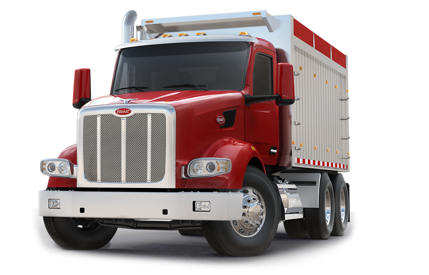 Updated Peterbilt vocational models | Peterbilt announced significant updates to the vocational Model 567 (pictured in a dump application) and 520 trucks. The key updates are found in the new VMUX electrical system, with enhanced functionality and integration with many different types of bodies for vocational customer applications. Exterior updates to the Model 567 include a cab-mounted side mirror, bright air intake bezel option and increased DEF tank volume. On the inside, the Model 567 features the 15-inch digital display launched with the new Model 579. A fully customizable user interface delivers easy-to read information and full PTO integration. Operators can fine-tune the display to suit individual preferences through controls on the all-new steering wheel. New driver-comfort features found inside include additional cabin storage, two permanent cup holders and options for 12V or USB charging ports. Safety systems, too, are integrated into the display -- such as lane-keeping assist, adaptive cruise control with auto resume, speed sign recognition, side objection detection, safety direct integration, multi-lane emergency braking and highway departure detection. The 567, combined with the 2021 Paccar MX-13 and MX-11 engines and Paccar transmission, sees a 2% improvement in fuel efficiency over earlier models and delivers increased reliability. In the 520 model, an all-new, seven-inch display in the center of the instrument cluster includes a conventional speedometer, tachometer and water and oil temperature gauges. It's also able to deliver information such as driver-assist and PTO status, digital gauges, a trip summary and more. The Model 520 added electronic stability control in September 2020 and is now available with Bendix Fusion with side objection detection, automatic emergency braking, lane departure warning, adaptive cruise control with auto resume, speed sign recognition and safety direct integration.