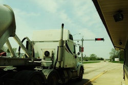 Semi-truck stopped at a scale