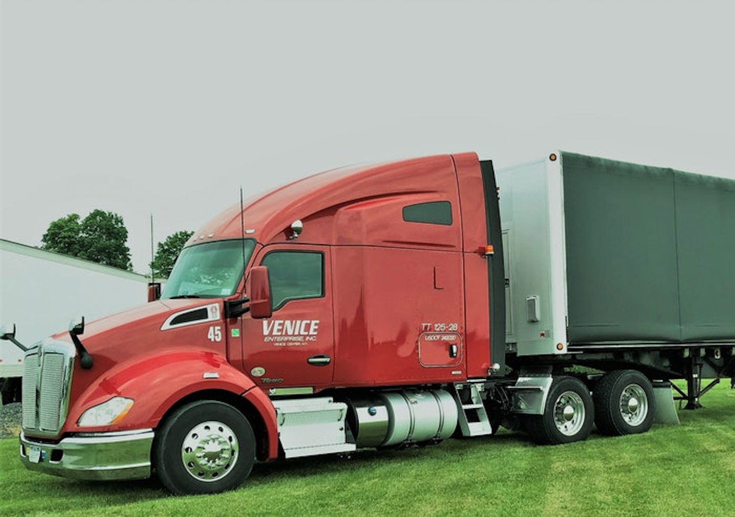 Venice Enterprise, pulling various trailer types (including this curtainside flatbed) out of New York State, is among an unknown number of small fleets to receive a Satisfactory safety rating as a result of an entirely offsite audit in 2020. It's among the few bright spots in FMCSA's turn to offsite review work during the pandemic.