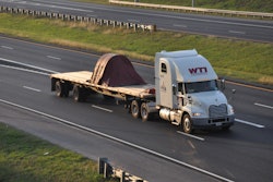 WTI flatbed truck on highway