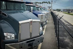semi trucks parked in a row