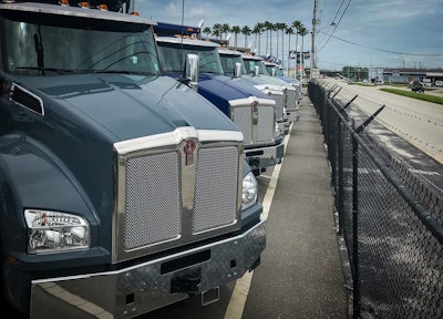 semi trucks parked in a row