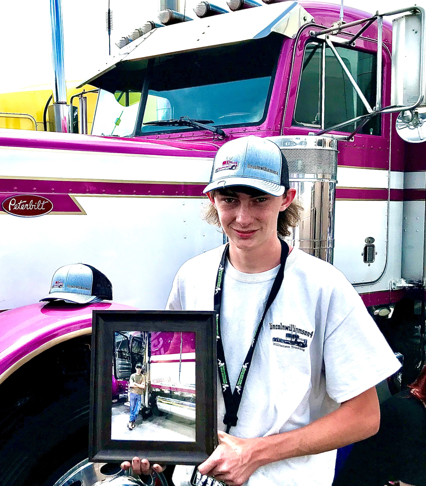 Lincoln Williamson outside of his custom peterbilt