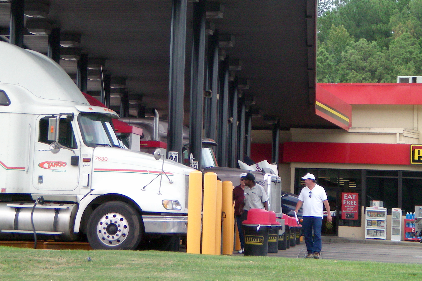 Semi trucks parked at Pilot gas station pumps