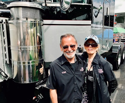 Tom and sunny billington outside of their custom peterbilt truck
