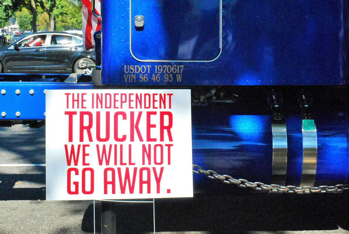 The independent trucker we will not go away protest sign