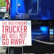 The independent trucker we will not go away protest sign
