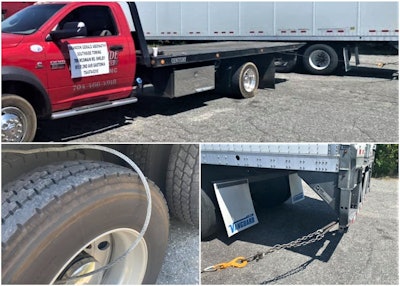 Tow truck attempting to tow semi truck