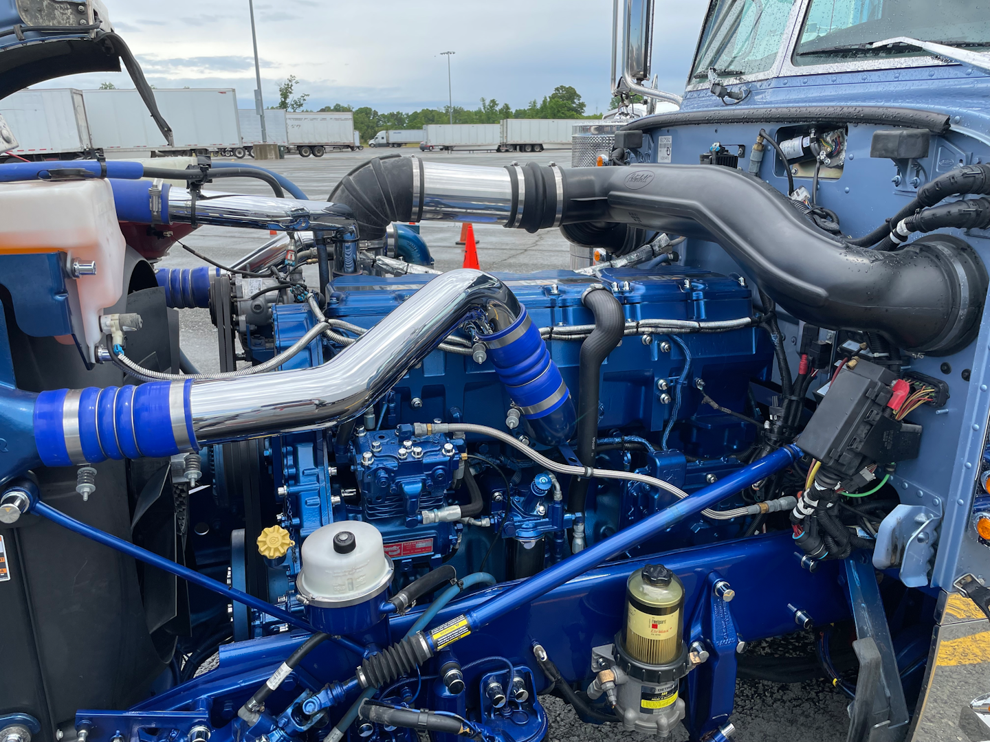 The 6NZ Cat is painted to match the frame and fenders in Peterbilt's Legendary Blue color.