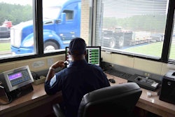 Inspection Officer Screening Trucks Scale