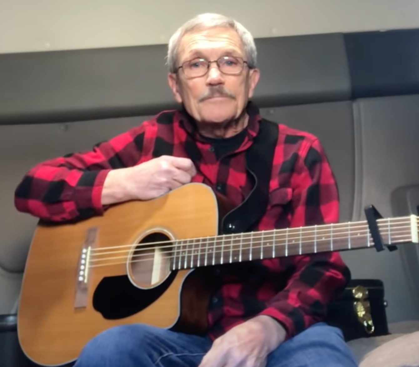 Milton Raphael with guitar