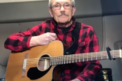 Milton Raphael with guitar