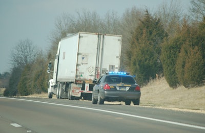 trooper pulling over semi truck