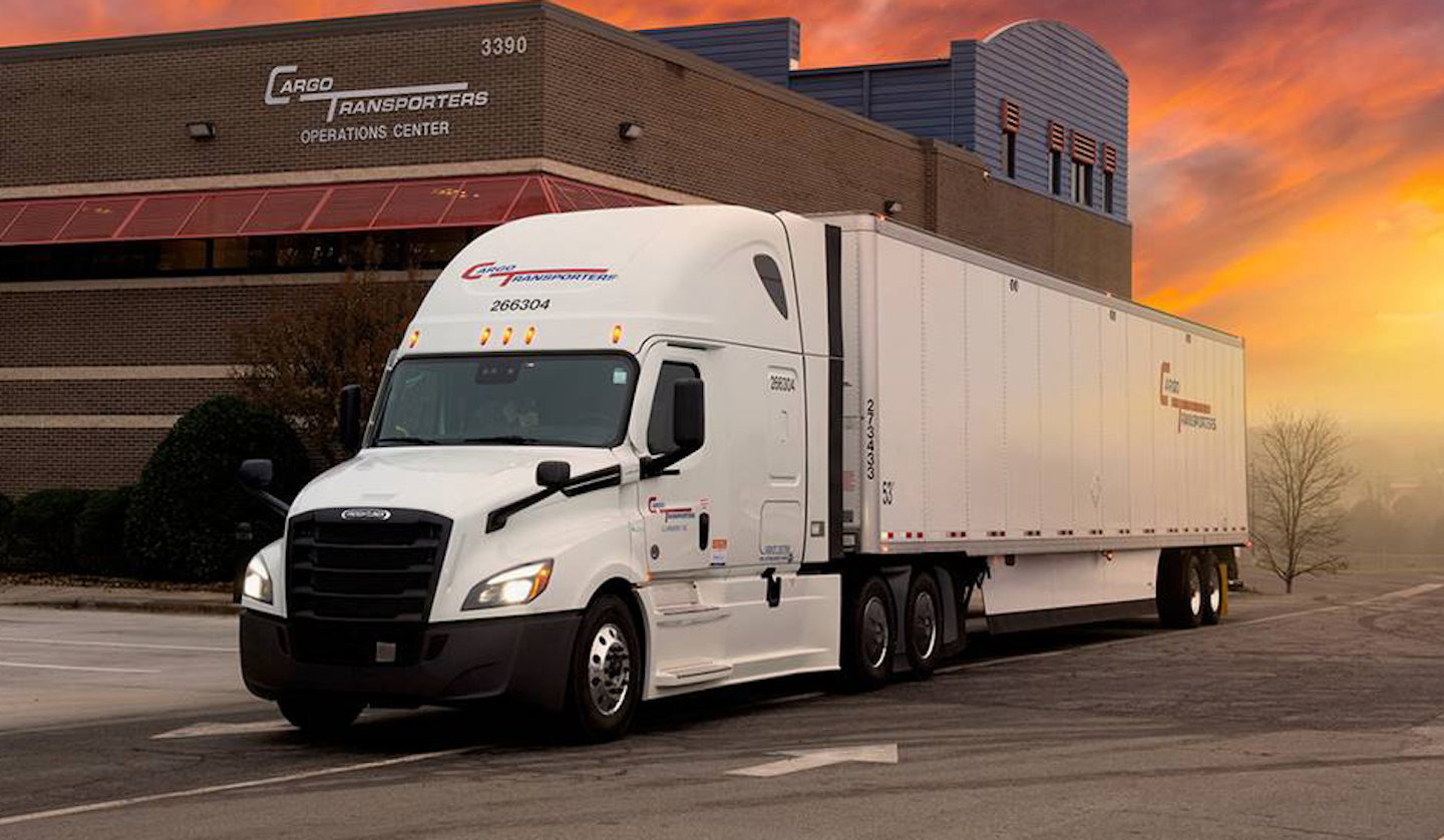 semi truck outside of cargo transporters building