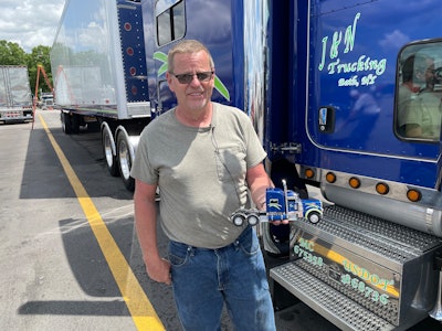Jeff walters next to custom peterbilt