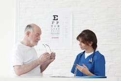 woman consulting with patient about eye exam