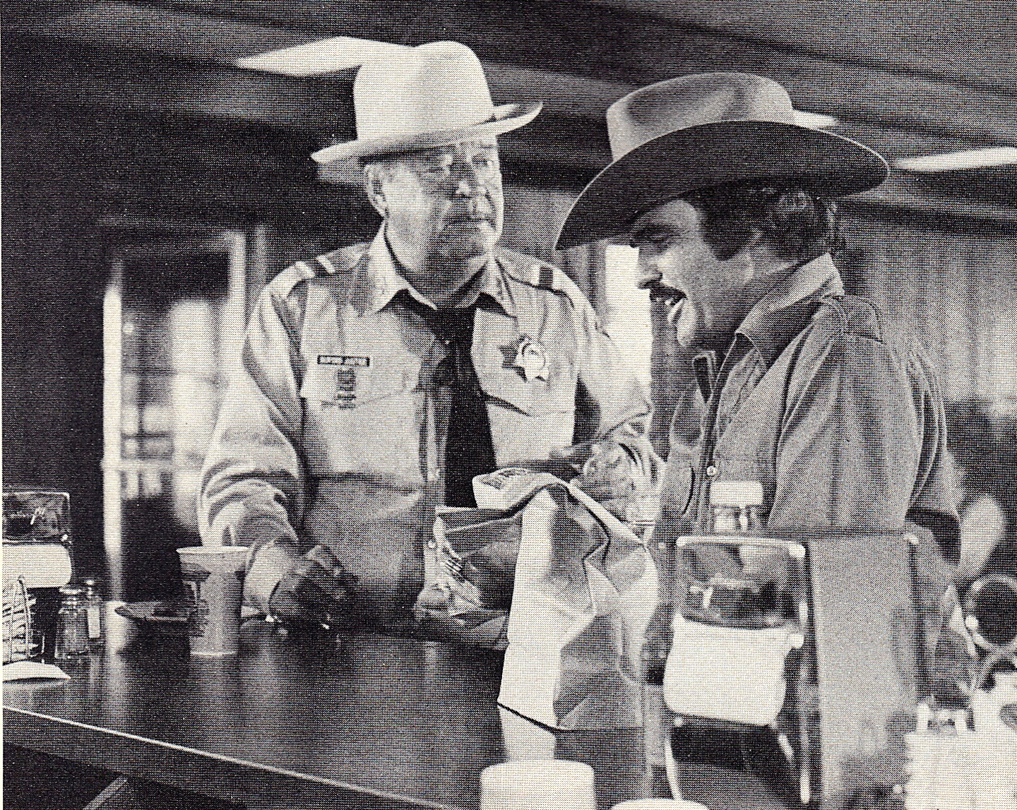 Jerry Reed’s hit song “Eastbound and Down,” from “Smokey and the Bandit,” was all about Burt Reynolds, right, playing Bandit and outfoxing Sheriff Buford T. Justice, played by Jackie Gleason.