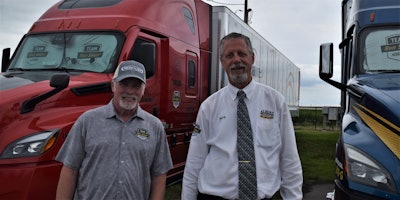 Clark Reed and owner-operator Henry Albert