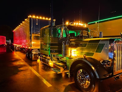 1986 Peterbilt 359 lit up at night