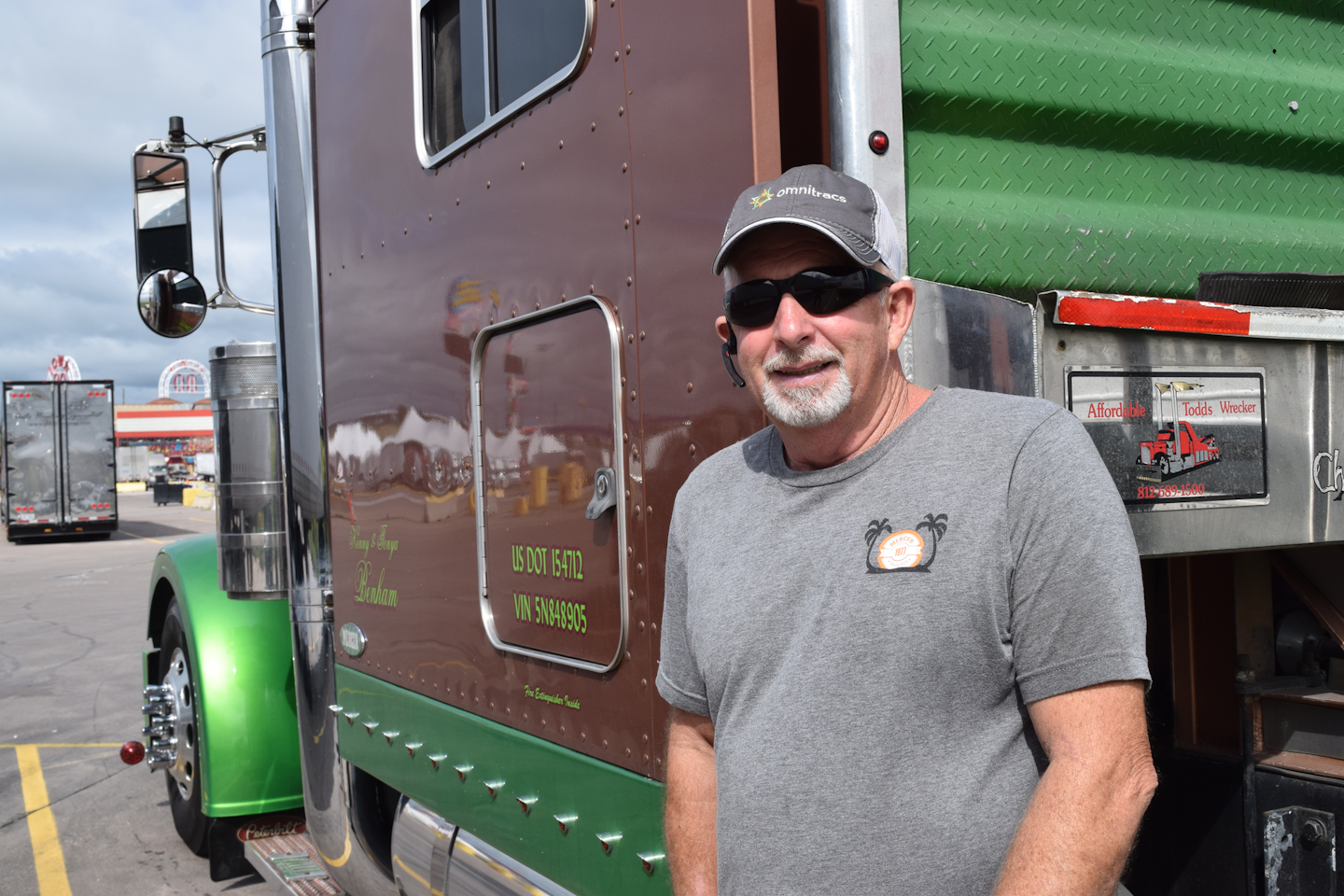 'I see a lot of trucks I wish I had.' --Kenny Benham's response to my initial query when we met on the show lot. He's nonetheless proud of design and install work put into his own 2005 379, whose fenders and cab extender panels you see here are by Bad Ass Customs out of Seymour, Indiana, and painted 'Synergy Green.' The color exudes an energy all its own, Beham said, 'what these owner-operators want.' That includes him, of course -- he said he found the color associated with original colors available for the 1968 Chevy Camaro.