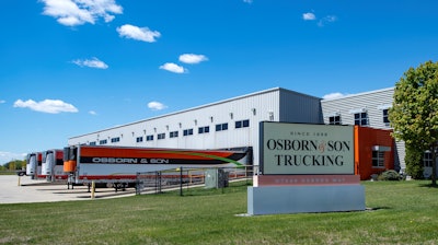 Osborn & Son Trucking acquired by Midwest Carriers president | Osborn & Son operations will not be interrupted by the purchase of the company by Midwest Carriers President Eric Van Handel. Osborn operates out of the pictured headquarters in Fond du Lac, Wisconsin, and had been owned by Dean and Sandy Osborn before their recent moves toward retirement and the sale. Many Osborn family members will stay working with the company and continue the Osborn tradition, Van Handel said. “Their 123-year history is a testament to the Osborns' success and their vast knowledge of the trucking industry. We’re excited to learn from them. We’ll be able to learn from each other.” Osborn & Son currently runs 21 tractors and 60 trailers, mostly refrigerated, and focus on steady freight in the alcoholic beverage niche. Along with the purchase of Osborn & Son Trucking, Van Handel also purchased Three-D Brokers. The companies will continue to operate separately. Altogether, the three companies employ 210 dedicated associates, operate 180 tractors and 550 trailers.