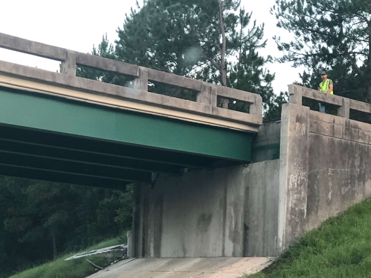 A raised dump bed struck the Georgia Highway 86 bridge over I-16, causing the highway to be shut down. Crews demolished the bridge and reopened the interstate ahead of schedule.