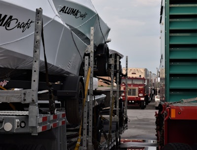 Stratton was parked next to another Koch truck loaded heavy with freight from its oversize division. And about this his first time participating in any kind of truck show, he said, 'How about this for a view in your tractor's mirror?'