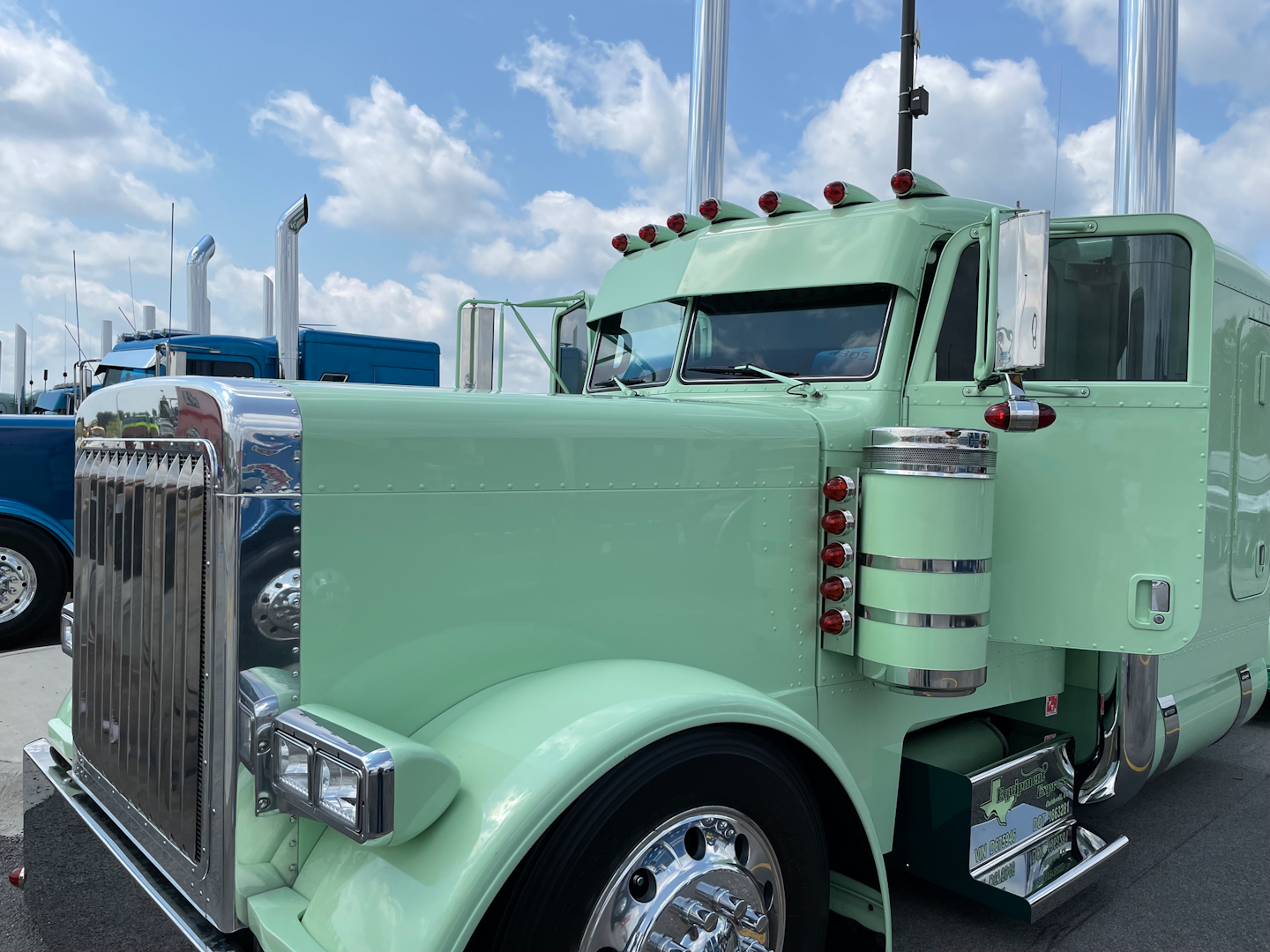 Randy Supak also hauls oversize/overweight freight for Equipment Express with this mint green 2007 Peterbilt 379.
