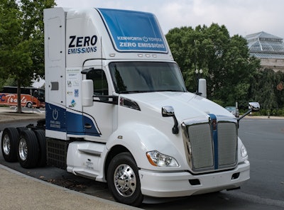 Kenworth's hydrogen fuel cell-powered electric-driver truck goes to Washington | Government agency officials and members of Congress recently had the opportunity to see a Kenworth T680 fuel cell electric vehicle (FCEV), powered by hydrogen, in Washington D.C., as pictured. The T680 daycab served as part of a backdrop for a U.S. Department of Energy (DOE) press conference, detailed via this link. Energy Secretary Jennifer Granholm was joined by White House National Climate Advisor Gina McCarthy for a discussion and ridealong in the Kenworth T680 FCEV. The following day, members of Congress, committee staff, and trade association executives stopped by for a visit and discussion. “This was a great opportunity to provide a hands-on look at the T680 fuel cell electric vehicle to leading government agency officials and members of Congress and their staffs,” said Kevin Baney, Kenworth general manager and PACCAR vice president. Kenworth has built 10 zero-emissions T680 FCEVs under the $82.5 million Shore-to-Store (S2S) project led by the Port of Los Angeles. The project is part of California Climate Investments, a statewide initiative that puts Cap-and-Trade dollars to work reducing greenhouse gas emissions. The demonstration project is moving forward with a $41.1 million grant from the California Air Resources Board’s Zero- and Near-Zero Emissions Freight Facilities (ZANZEFF) program. Kenworth's zero-emissions EV program also features the Class 8 Kenworth T680E battery-electric and medium duty Kenworth K270E and K370E battery-electric vehicles, which are all available for order. The vehicles are designed for local pickup and delivery, drayage, and short regional haul applications.