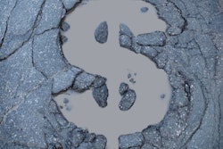 pothole in shape of dollar sign