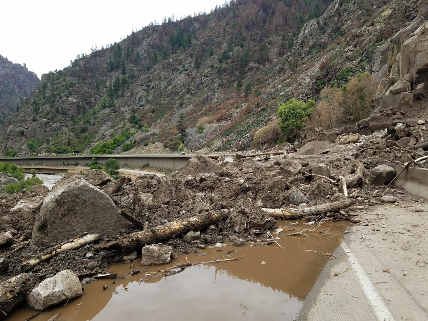 I-70 in Colorado's Glenwood Canyon remains closed Tuesday following mudslides caused by heavy rain over the weekend.